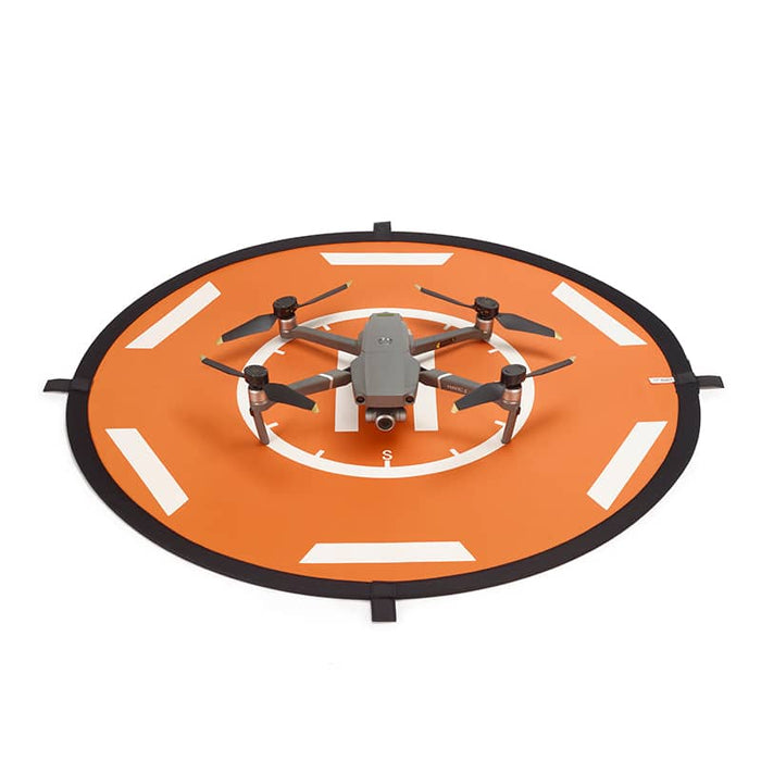 Helipad oranje met drone