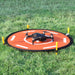 Helipad met drone in gras